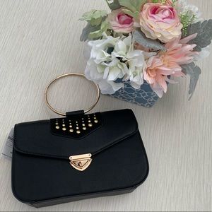 Neiman Marcus • Black bracelet handle crossbody